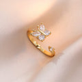Bague papillon blanc dorée anti-stress ajustable