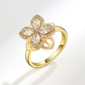 Bague fleur strass blanc dorée anti-stress ajustable