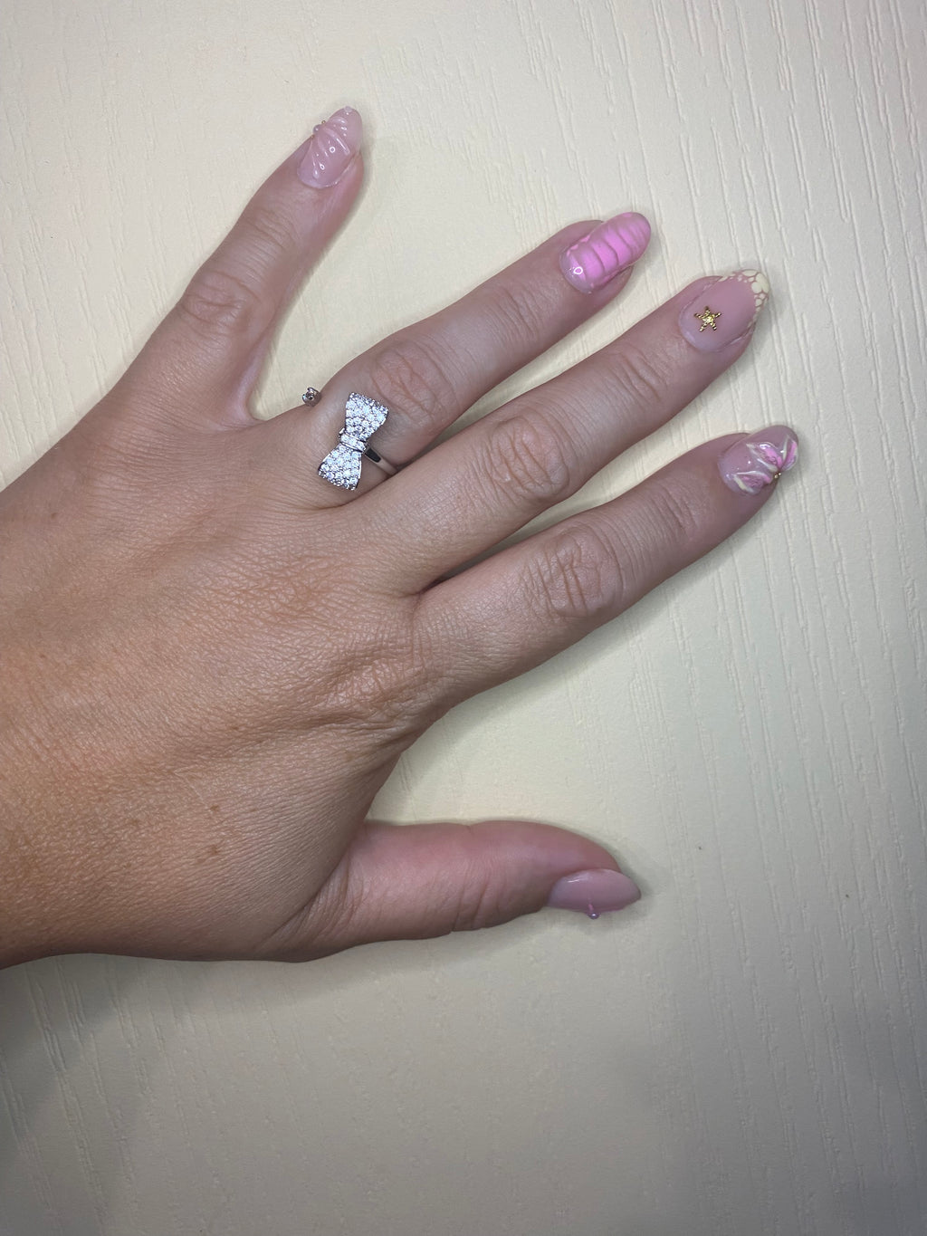 Bague nœud argenté pivotant anti-stress ajustable