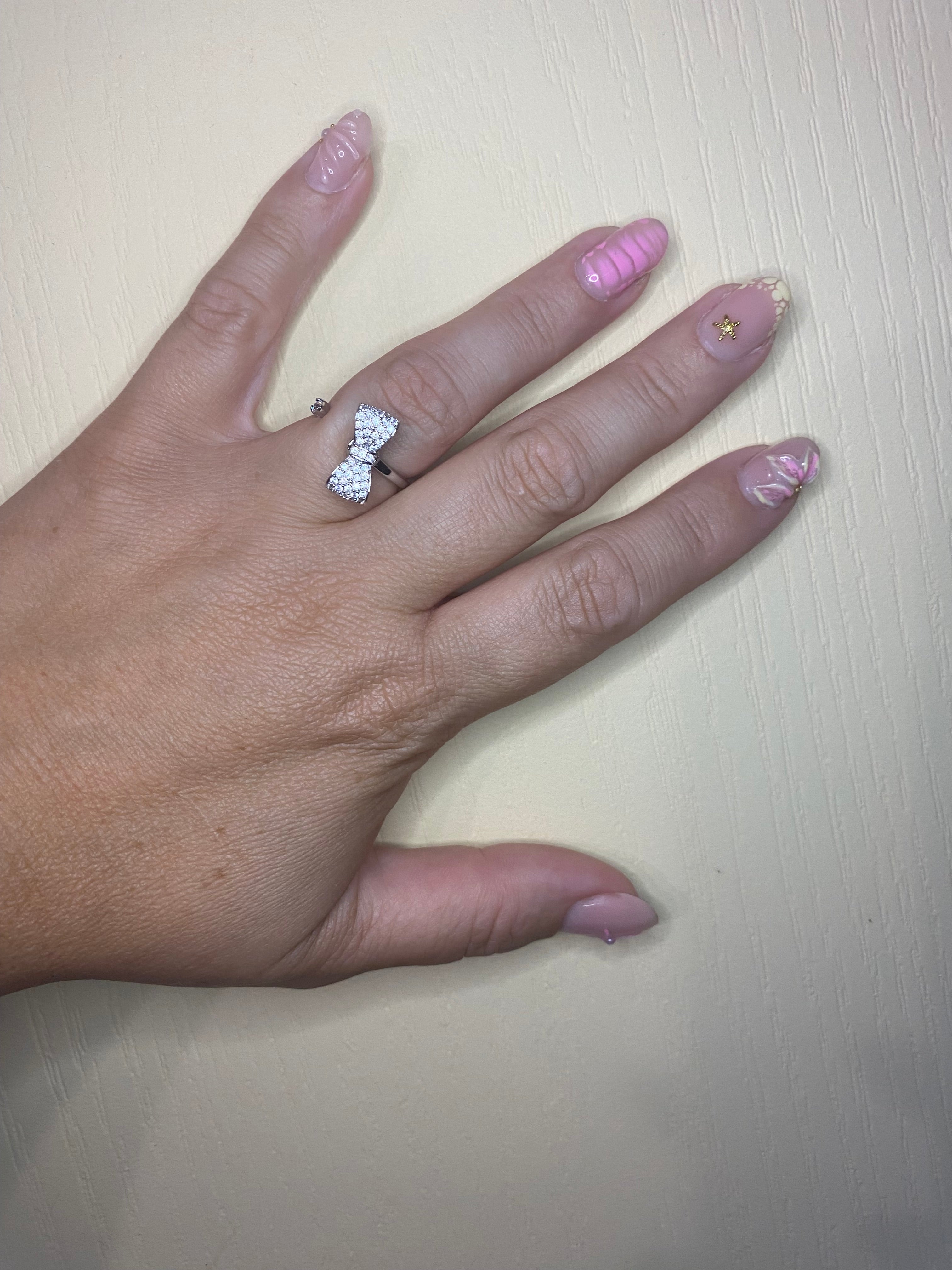 Bague nœud argenté pivotant anti-stress ajustable