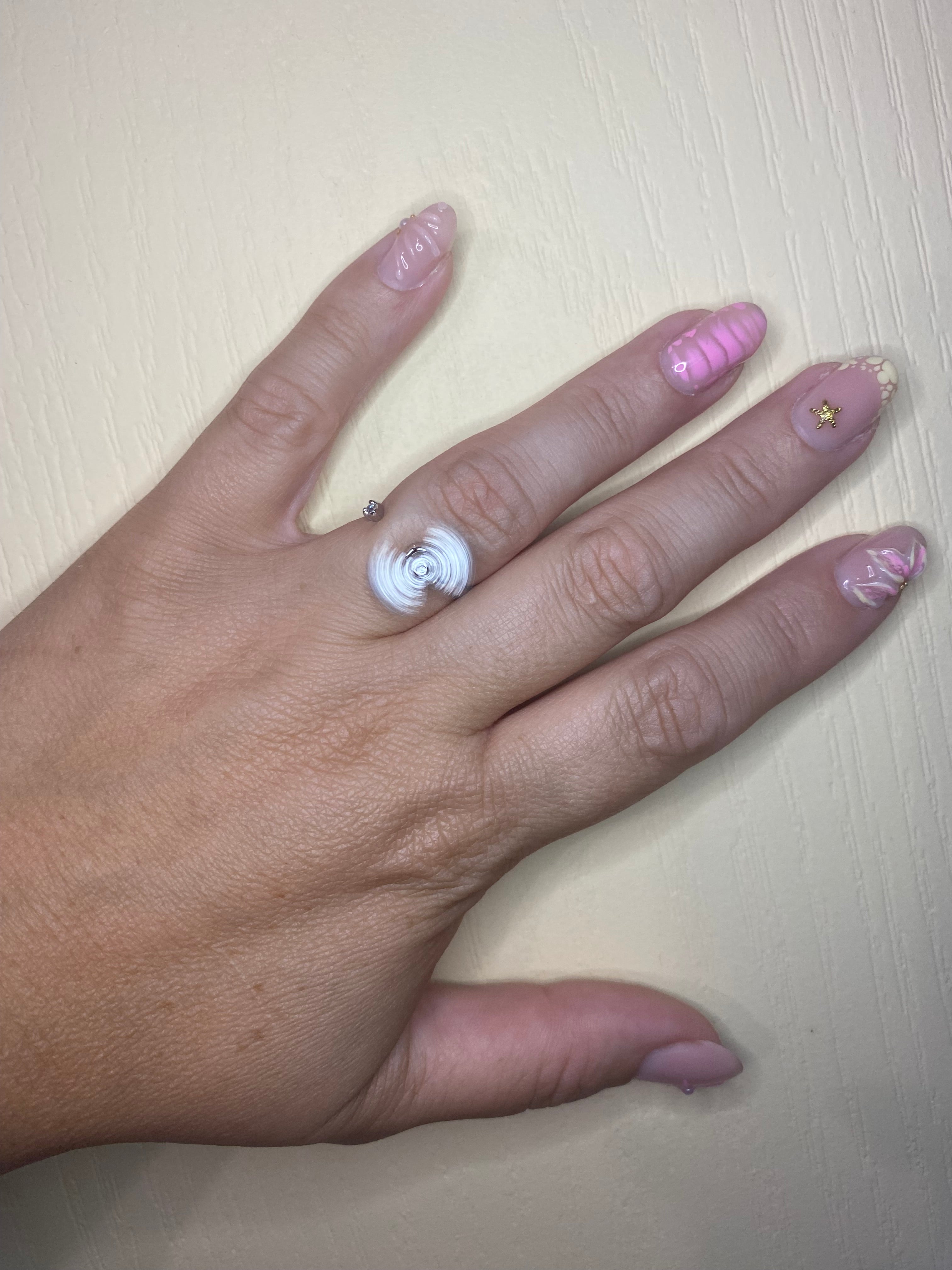 Bague nœud argenté pivotant anti-stress ajustable