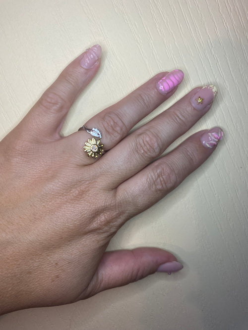 Bague fleur jaune pivotante et feuille argentée anti-stress ajustable