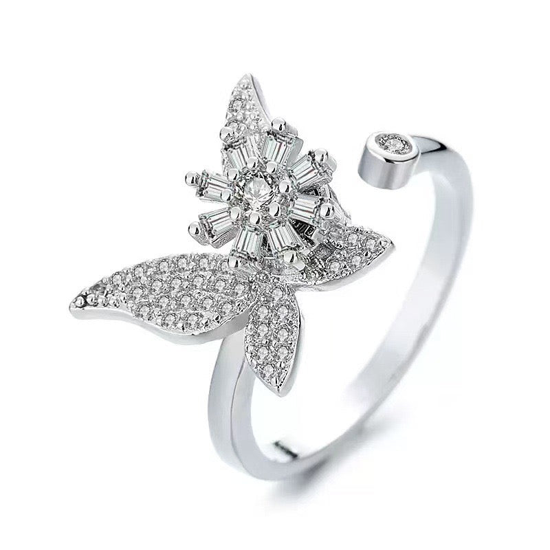 Bague papillon strass argenté intérieure fleur pivotante anti-stress ajustable