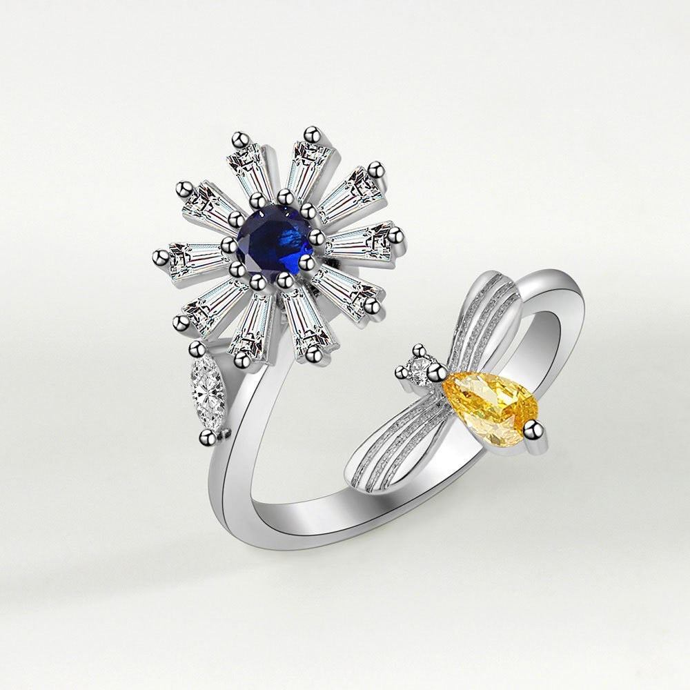 Bague fleur cœur bleu pivotant et insecte jeune&nbsp; pivotante anti-stress ajustable