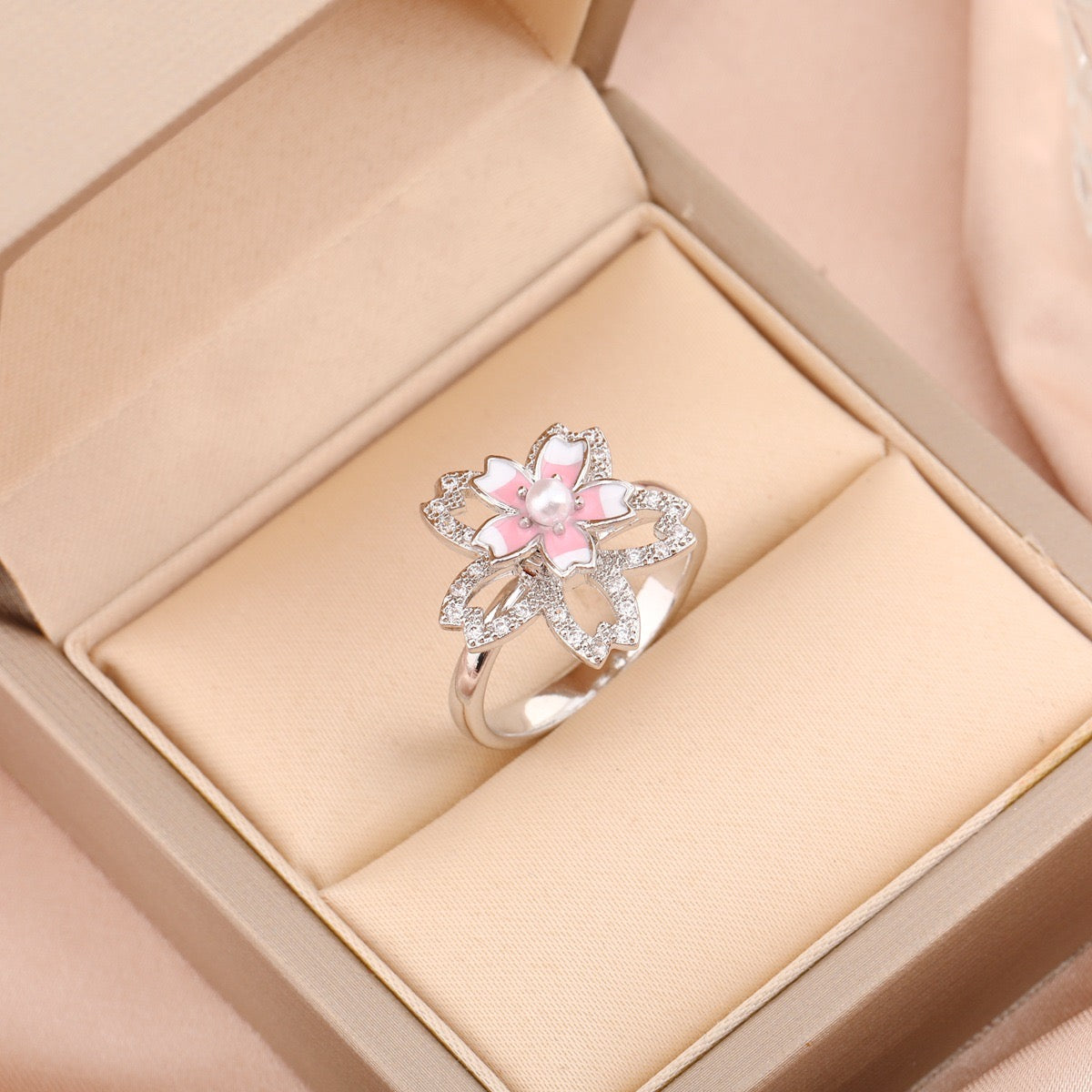 Bague fleur strass intérieurs fleur rose et blanche argentée pivotante anti-stress ajustable