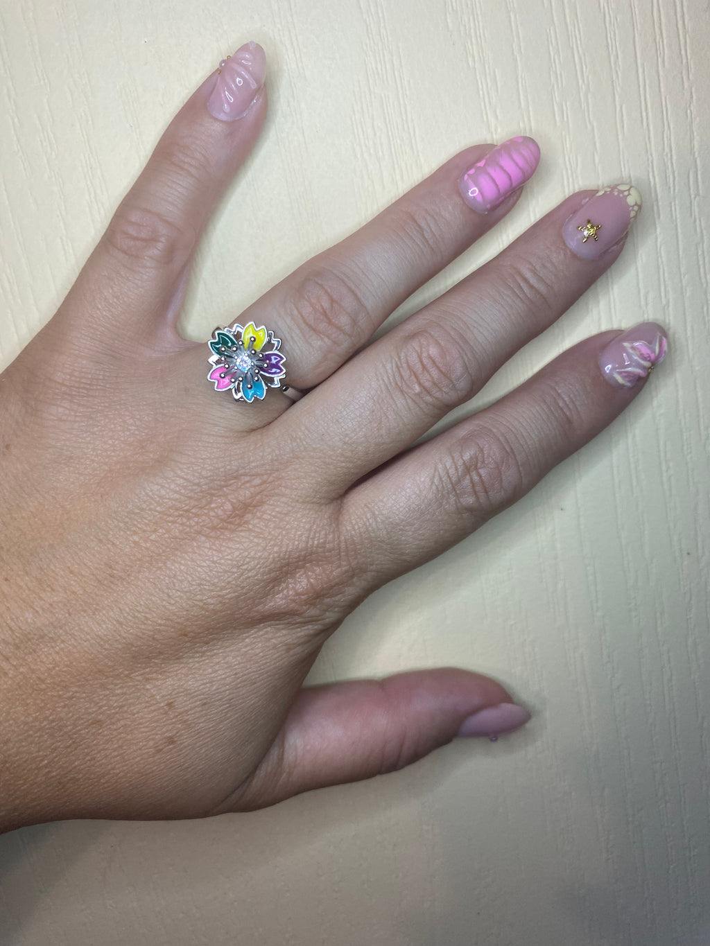 Bague fleur multicolore pivotante anti-stress ajustable