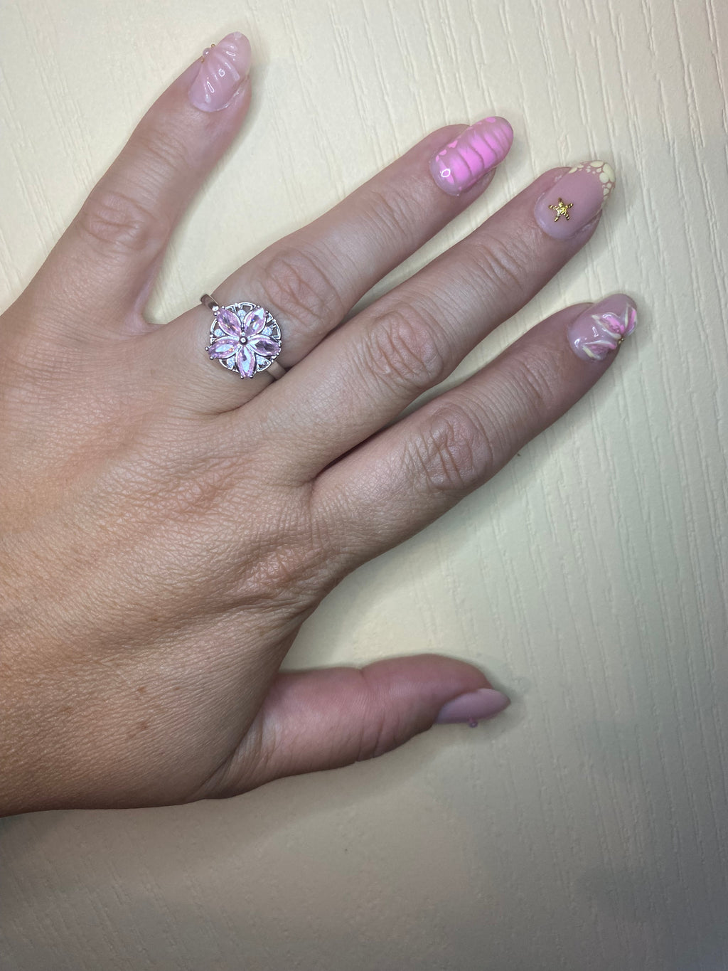 Bague fleur rose stress argentée pivotante anti-stress ajustable