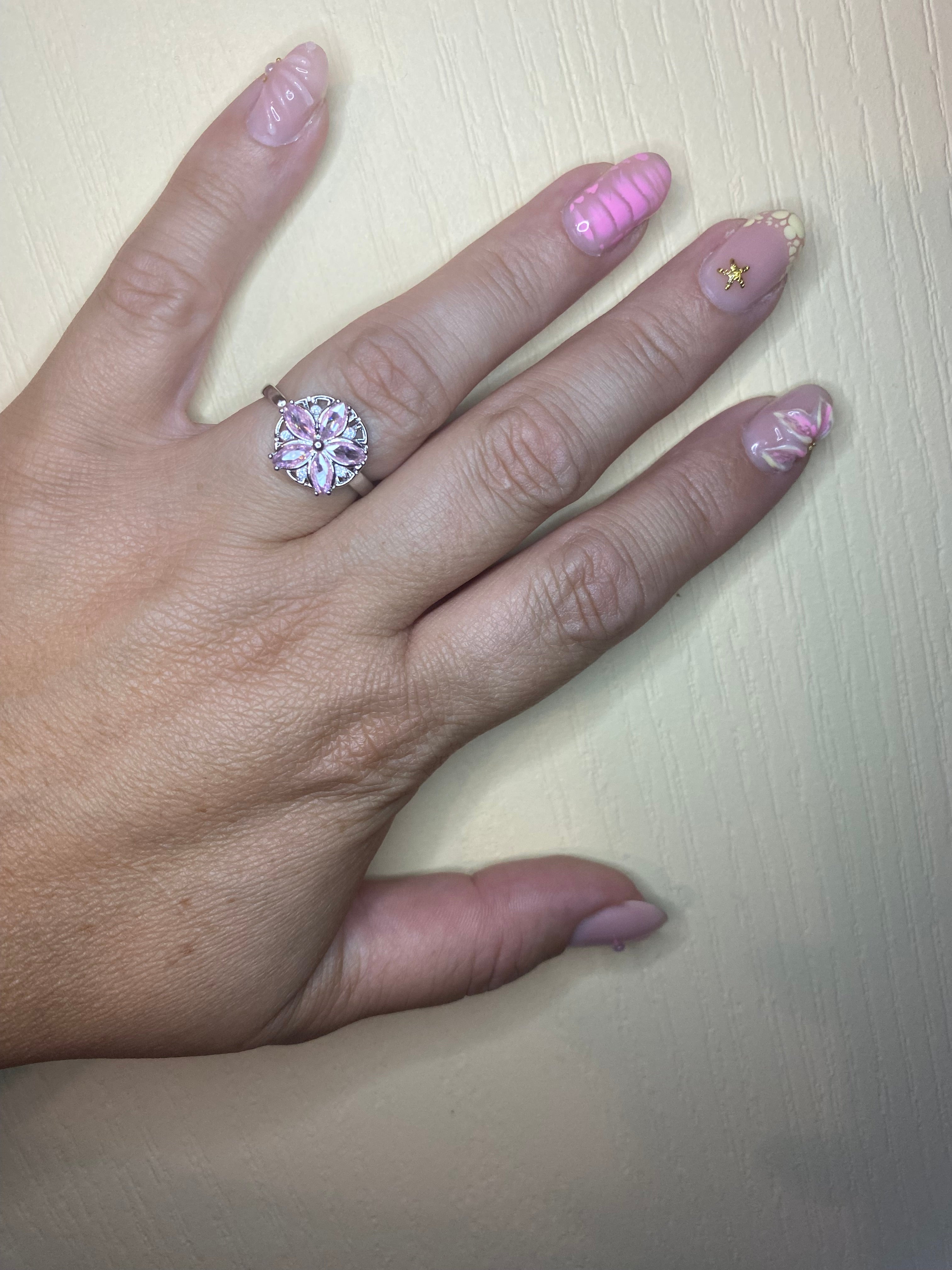 Bague fleur rose stress argentée pivotante anti-stress ajustable