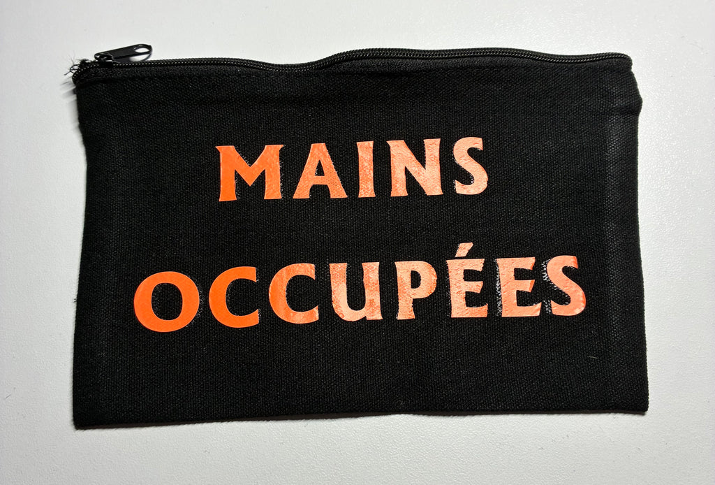 La Pochette live Noire : Mains occupées esprit leger en orange