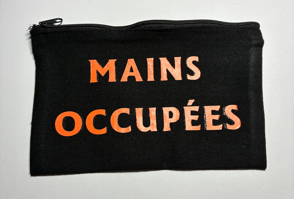La Pochette live Noire : Mains occupées esprit leger en orange