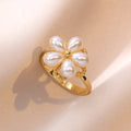 Bague fleur blanche (perle) argentée anti-stress ajustable