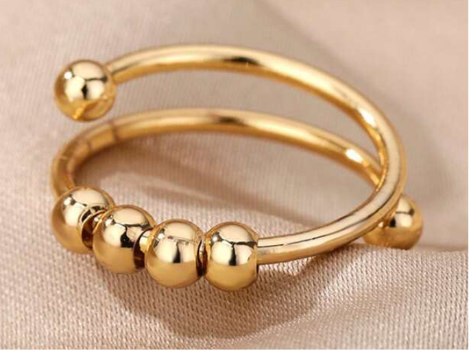 Bague anti-stress à 4 perles mobiles
